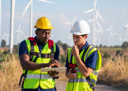 Two Civil Engineers are discussing about the project